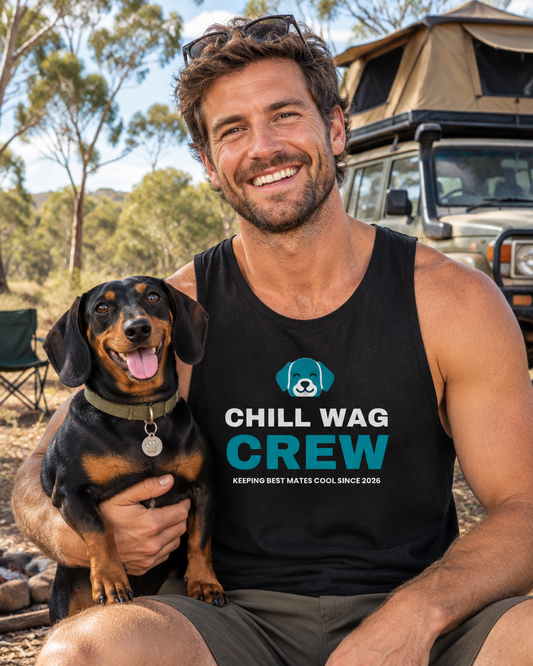 Smiling man in a black Chill Wag Crew singlet at a bush campsite holding his Dachshund (AI-generated image)
